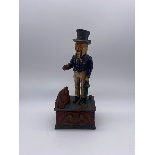 554 - CAST IRON NOVELTY UNCLE SAM MONEY BANK