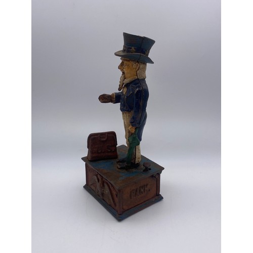 554 - CAST IRON NOVELTY UNCLE SAM MONEY BANK