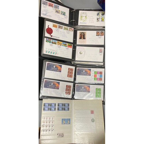 587 - THREE BINDERS OF GB POTSAGE FIRST DAY COVERS AND A GB AND COMMONWEALTH STAMP ALBUM