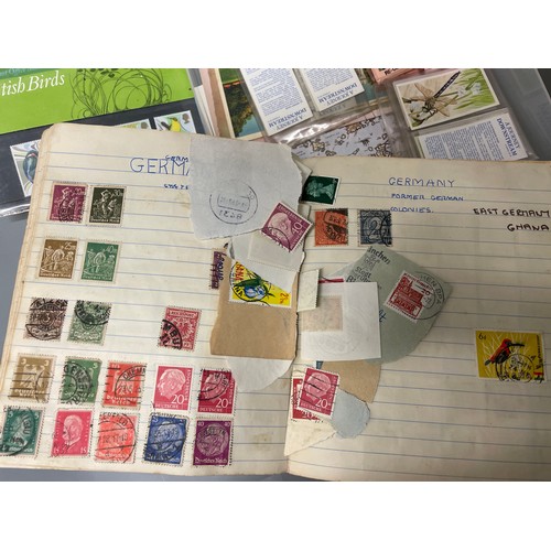 592 - SMALL POSTAGE STAMP ALBUM, SOME POST OFFICE MINT STAMP PACKS, AND OTHER CARDS