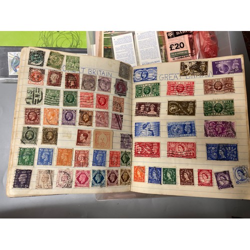 592 - SMALL POSTAGE STAMP ALBUM, SOME POST OFFICE MINT STAMP PACKS, AND OTHER CARDS