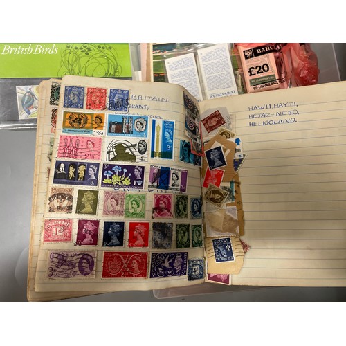 592 - SMALL POSTAGE STAMP ALBUM, SOME POST OFFICE MINT STAMP PACKS, AND OTHER CARDS