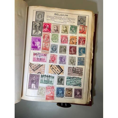 590 - WORLD STAMP ALBUM VICTORIA ONWARDS, PLUS BAG OF FRANKED POSTAGE STAMPS