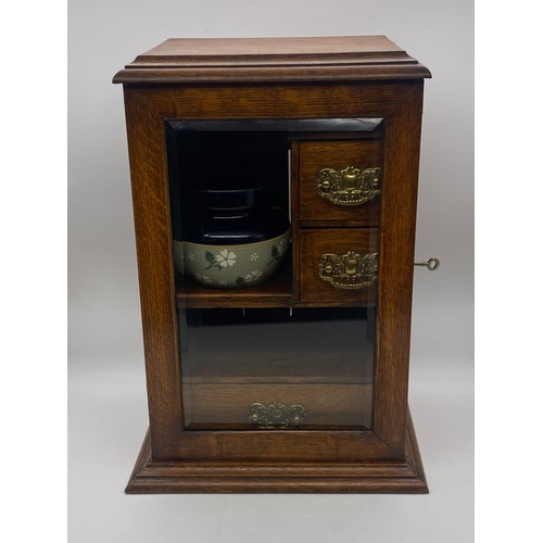 603 - OAK GLAZED DOOR SMOKERS CABINET WITH STONEWARE HUMIDOR