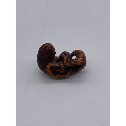 517 - NETSUKE OF MERMAID AND CHILD