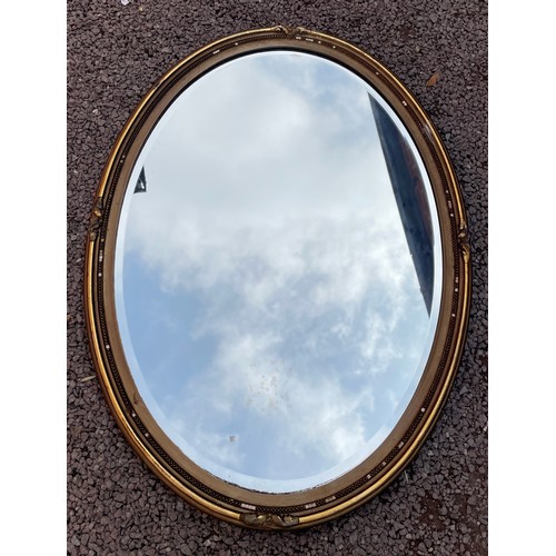 693 - GILDED BEADED OVAL FRAMED MIRROR