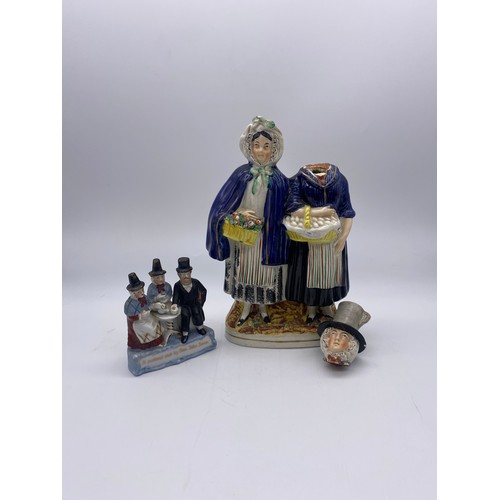 263 - STAFFORDSHIRE FIGURE GROUP OF TWO WELSH LADIES WITH BASKETS A/F AND A CONTINENTAL FAIRING ENTITLED A... 