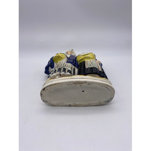 263 - STAFFORDSHIRE FIGURE GROUP OF TWO WELSH LADIES WITH BASKETS A/F AND A CONTINENTAL FAIRING ENTITLED A... 