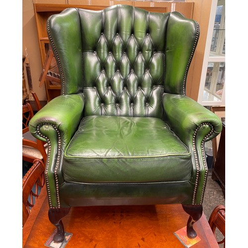 50 - BOTTLE GREEN BUTTON BACK LEATHER WING ARM CHAIR