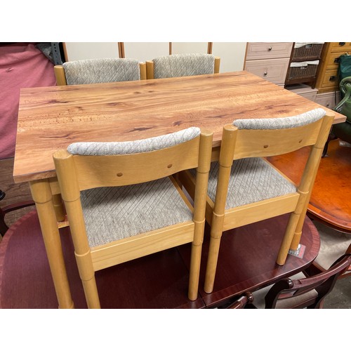 43 - BEECH FORMICA TOPPED KITCHEN TABLE AND FOUR CHAIRS