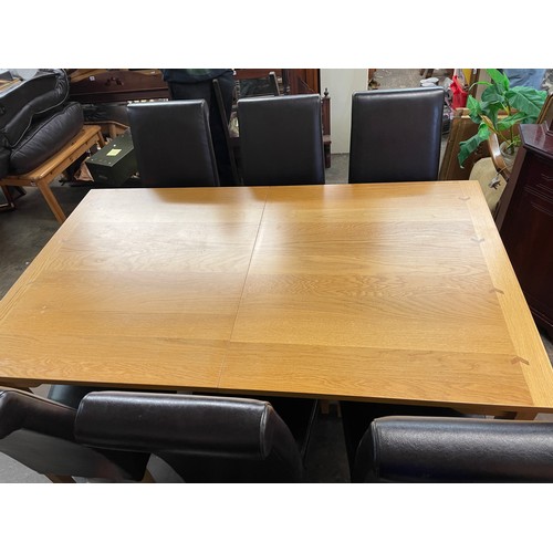178 - GOOD QUALITY OAK DINING TABLE WITH SIX TAN HIGH BACK CHAIRS