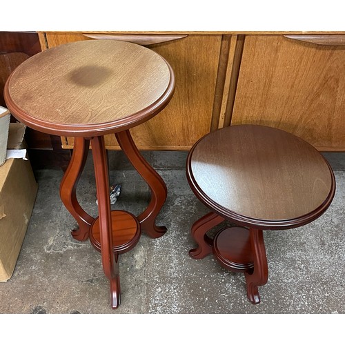 110 - TWO MAHOGANY CIRCULAR TOPPED OCCASIONAL TABLE ON OUTSWEPT LEGS