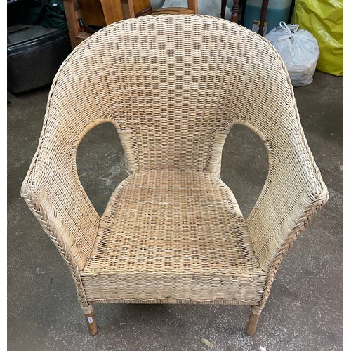 91 - THREE RATTAN AND CANE WORK GARDEN CHAIRS WITH LOOSE CUSHIONS