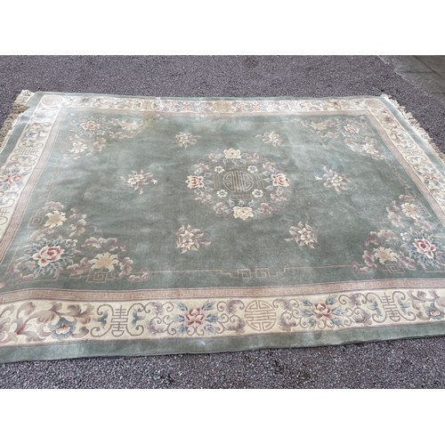 63 - LARGE GREEN PATTERN CARPET 375CM X 275CM APPROX