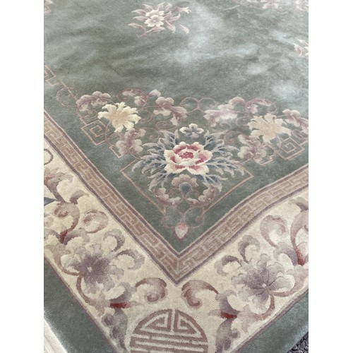 63 - LARGE GREEN PATTERN CARPET 375CM X 275CM APPROX