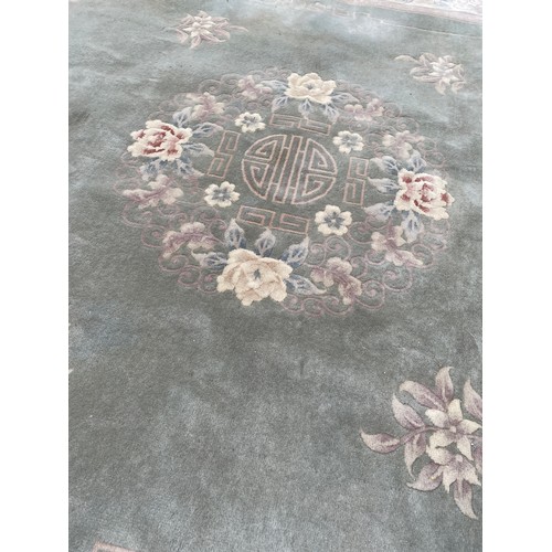 63 - LARGE GREEN PATTERN CARPET 375CM X 275CM APPROX