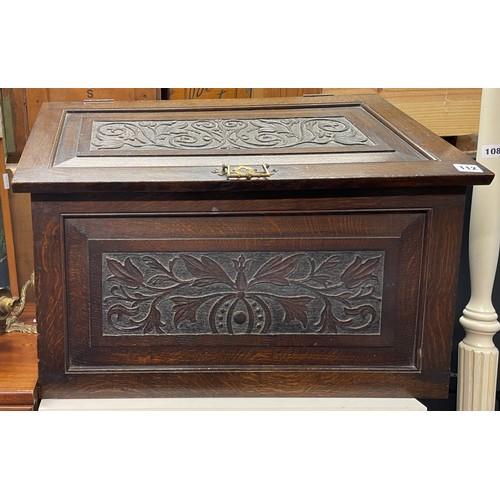112 - OAK CARVED PANEL SLANT FRONTED BOX