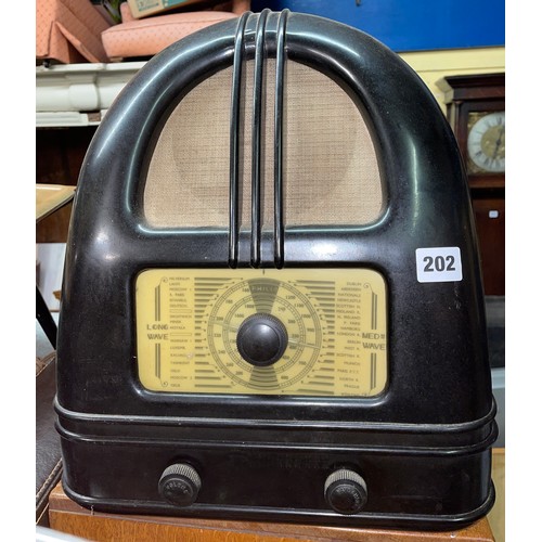 202 - BAKELITE CASED ARCHED MAINS RADIO