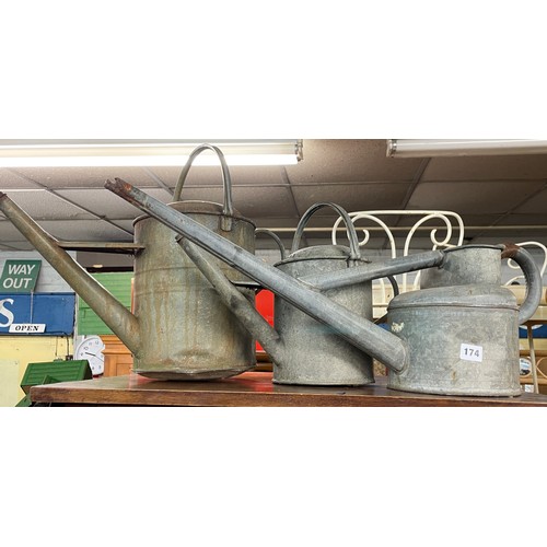 174 - THREE GALVANISED WATERING CANS