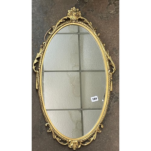 184 - GILT OVAL ROPE EDGED MIRROR