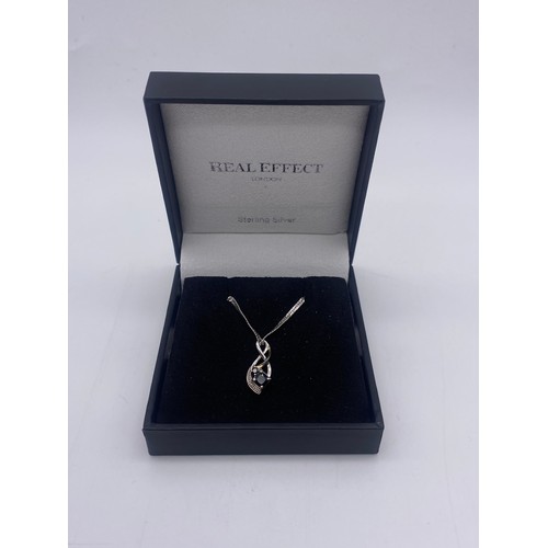 652 - 9CT WHITE GOLD SAPPHIRE PENDANT ON ROPE TWIST CHAIN 3G APPROX AND AN UNMARKED YELLOW BANGLE