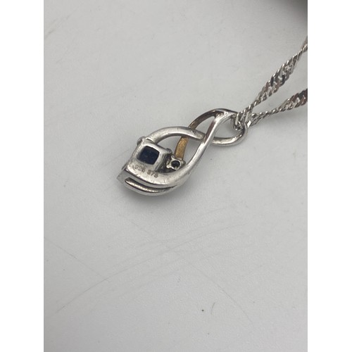 652 - 9CT WHITE GOLD SAPPHIRE PENDANT ON ROPE TWIST CHAIN 3G APPROX AND AN UNMARKED YELLOW BANGLE