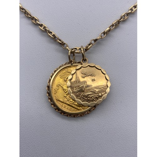 656 - 1912 GEORGE V SOVEREIGN AND A 9CT GOLD ST CHRISTOPHER PENDANT ON 9CT CHAIN 25G OVERALL APPROX