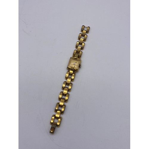 663 - LADIES GOLD PLATED SQUARE FACED WRIST WATCH ON LINK STRAP