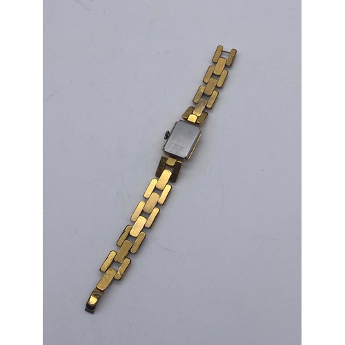 663 - LADIES GOLD PLATED SQUARE FACED WRIST WATCH ON LINK STRAP