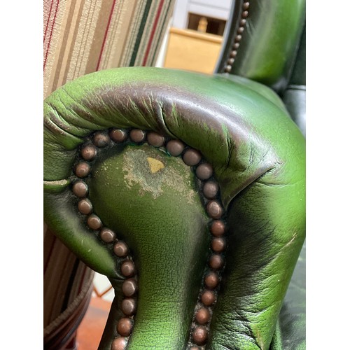 50 - BOTTLE GREEN BUTTON BACK LEATHER WING ARM CHAIR