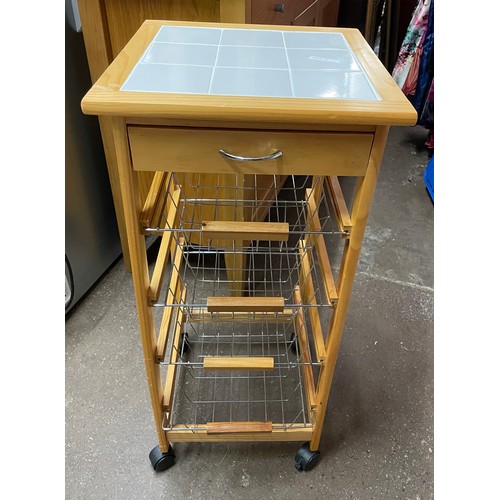 127 - PINE TILE TOP MOBILE KITCHEN TROLLEY WITH WIRE BASKETS