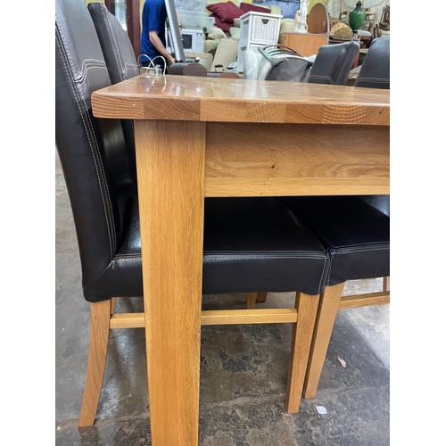 107 - CONTEMPORARY LIGHT OAK TABLE AND SIX BROWN HIGH BACK CHAIRS