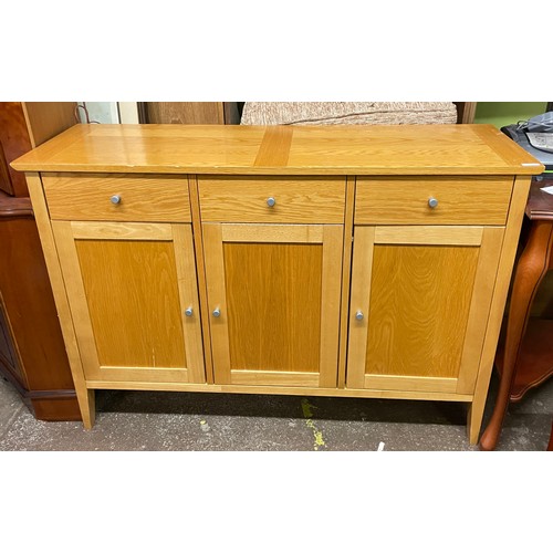 165 - CONTEMPORARY OAK THREE CUPBOARD SIDEBOARD