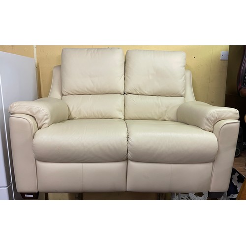 124 - CREAM LEATHER TWO SEATER SOFA