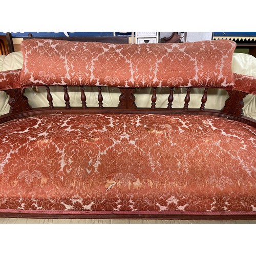 125 - LATE VICTORIAN UPHOLSTERED CURVED BACK SETTEE