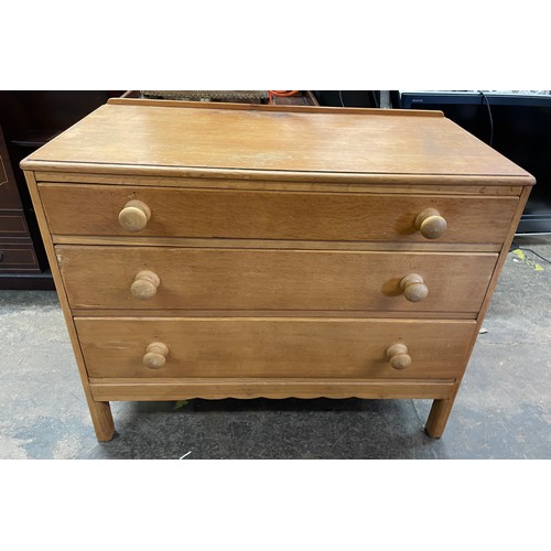 57 - LIGHT OAK THREE DRAWER CHEST WITH TURNED WOODEN HANDLES