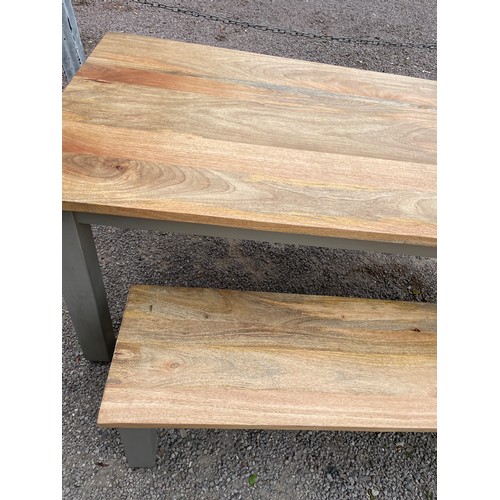 83 - MANGO WOOD TOP EXTENDING OBLONG TABLE ON CHUNKY LEGS AND BENCH