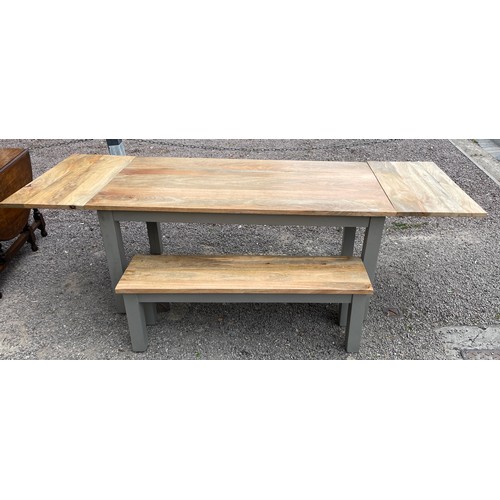 83 - MANGO WOOD TOP EXTENDING OBLONG TABLE ON CHUNKY LEGS AND BENCH