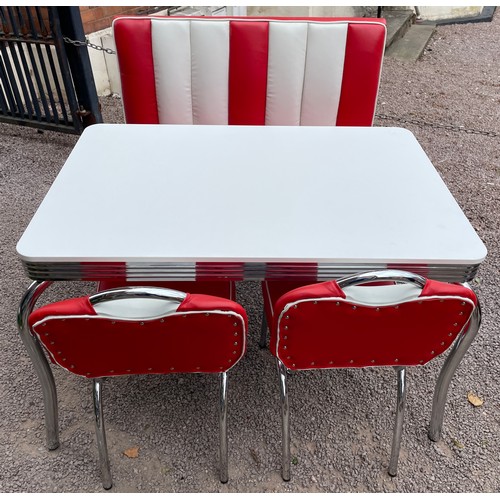 85 - AMERICAN DINER STYLE RED AND WHITE UPHOLSTERED CHROME TABLE WITH BENCH SEAT AND SIDE CHAIRS