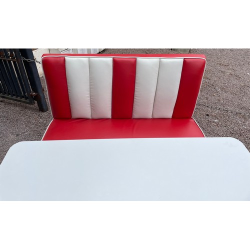 85 - AMERICAN DINER STYLE RED AND WHITE UPHOLSTERED CHROME TABLE WITH BENCH SEAT AND SIDE CHAIRS