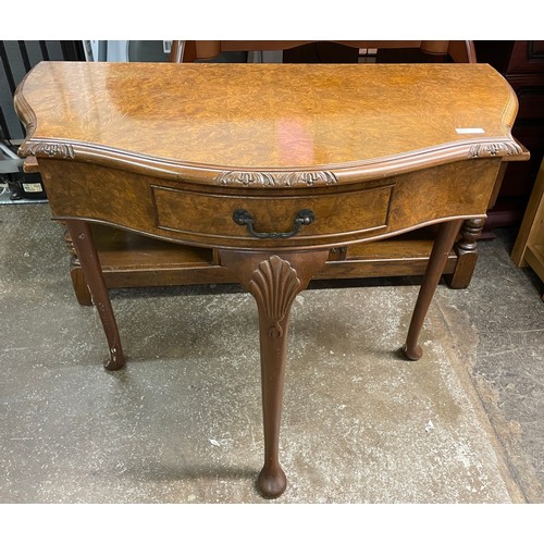 48 - BURR WALNUT SERPENTINE CONSOLE TABLE