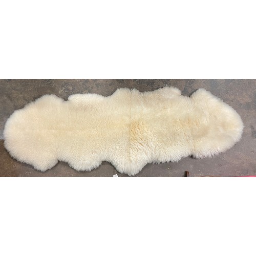 112 - LARGE SHEEP SKIN RUG