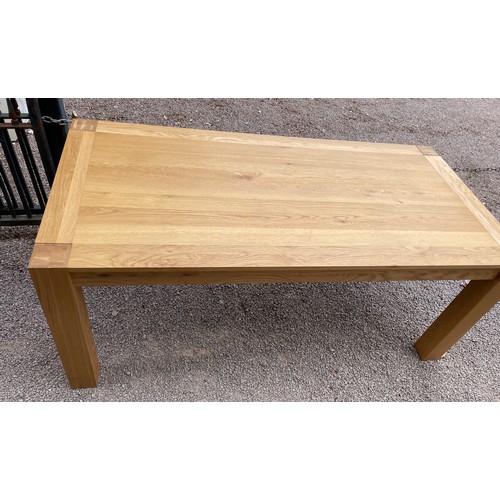 94 - CONTEMPORARY OAK OBLONG DINING TABLE ON CHUNKY SQUARE LEGS