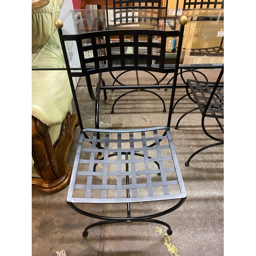 142 - WROUGHT IRON FRAMED GLASS TOPPED DINING TABLE WITH SIX LATTICE WORK CHAIRS