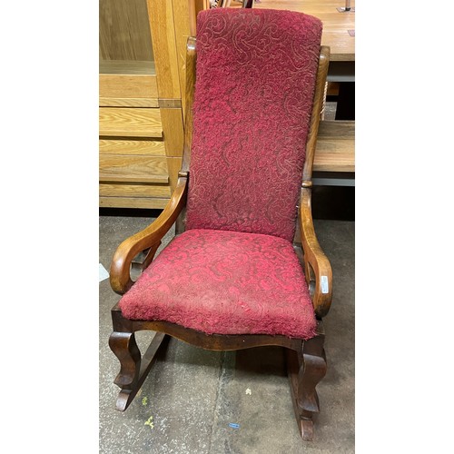 129 - VICTORIAN MAHOGANY UPHOLSTERED ROCKING CHAIR