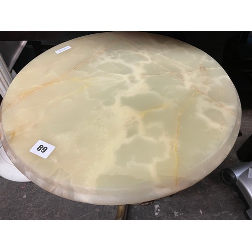 89 - GILT METAL BASED CIRCULAR ONYX TOPPED TABLE