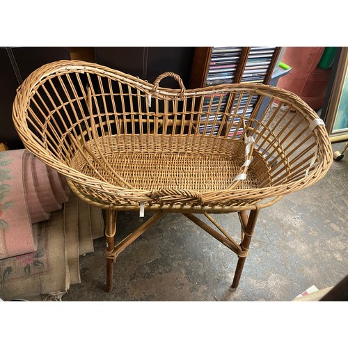 145 - WICKER AND CANE WORK MOSES BASKET ON STAND