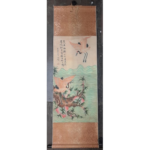 564 - JAPANESE HANGING SCROLL PAINTING OF CRANES AMIDST PEACH TREES