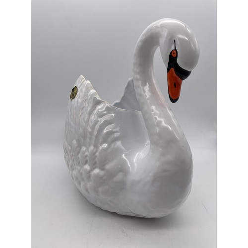 424 - LARGE POTTERY SWAN PLANTER