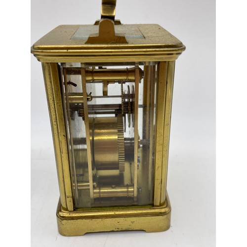 439 - BRASS CASED CARRIAGE CLOCK AND AN EASEL BACKED BRASS TIME PIECE